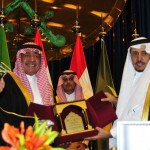 Handing over a gift to HRH Prince Miqren